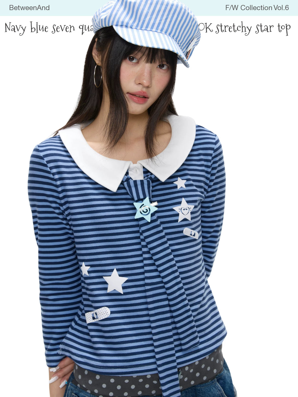Navy star-pattern puff-sleeve top with peter pan collar