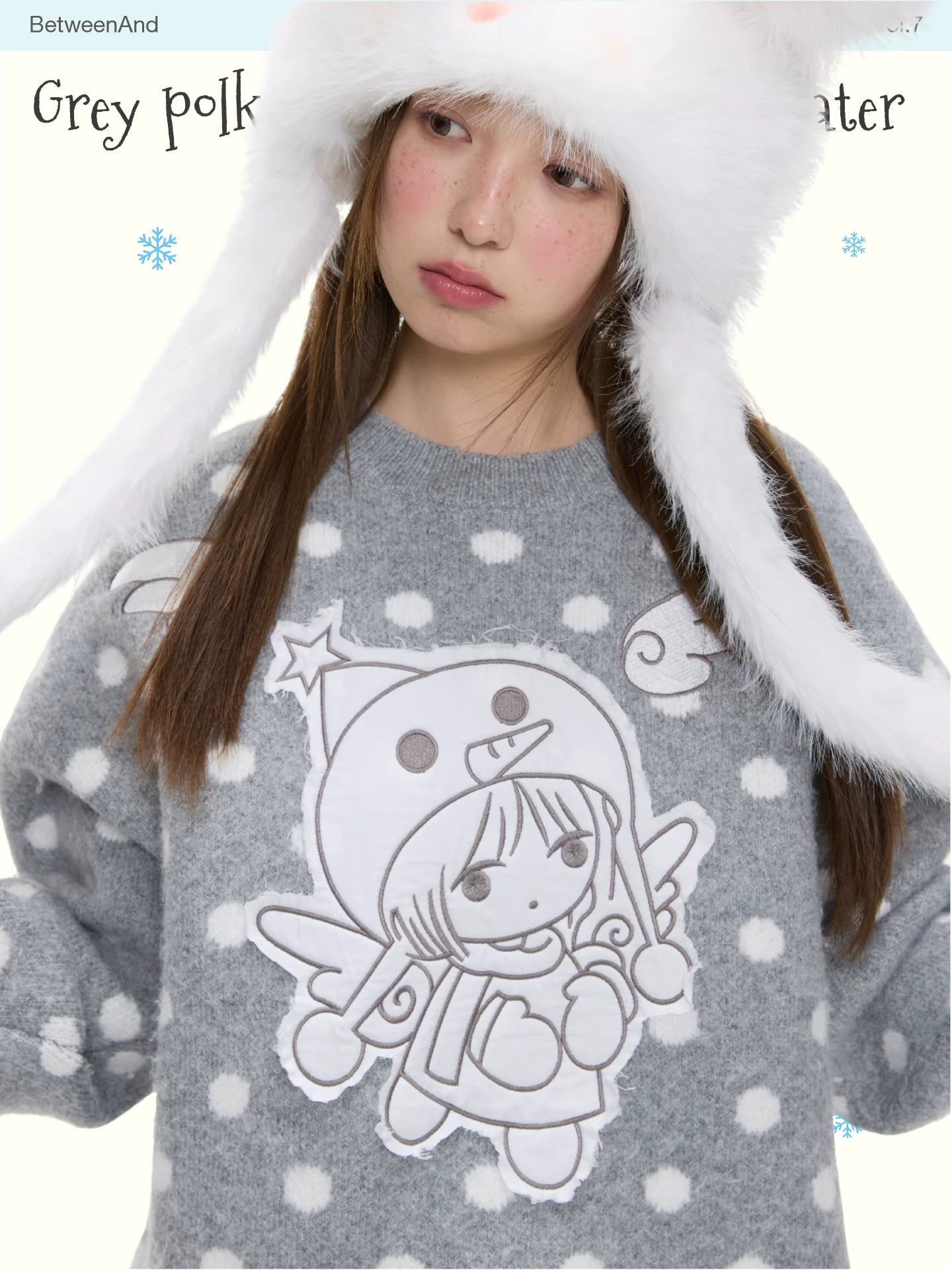 Grey polka dot soft pullover sweater with penguin angel print