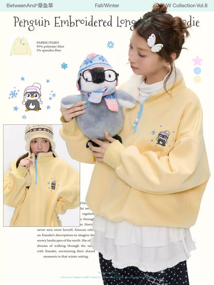 Soft yellow penguin embroidered fleece sweatshirt