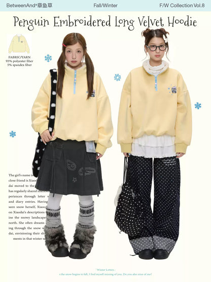 Soft yellow penguin embroidered fleece sweatshirt