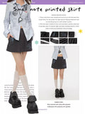 Small note printed skirt
