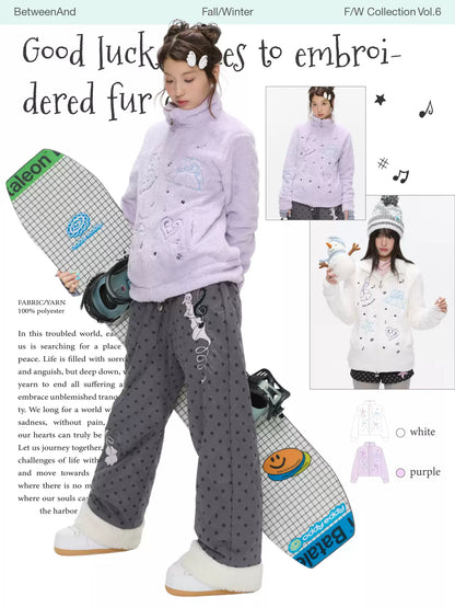 Cream embroidered fleece jacket with soft plush texture